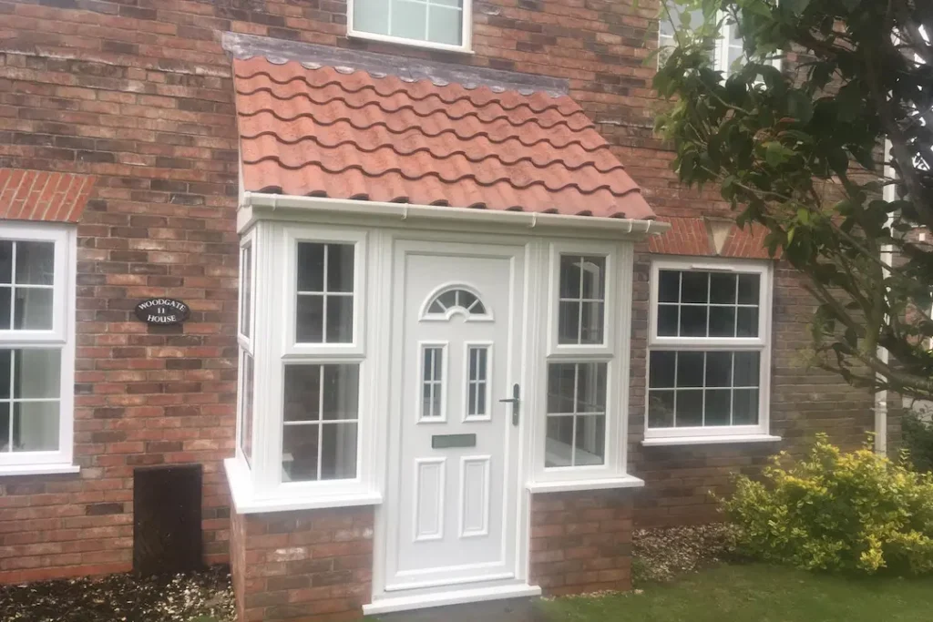 White Upvc Porch With Bespoke Roof